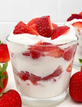 Easy Strawberries and Cream in Glass Cup With White Background