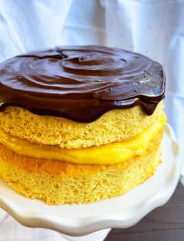 Easy Boston Cream Pie on White Cake Stand