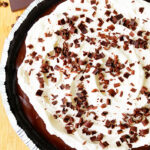 Easy No Bake Chocolate Cream Pie With Oreo Crust on Wood Background