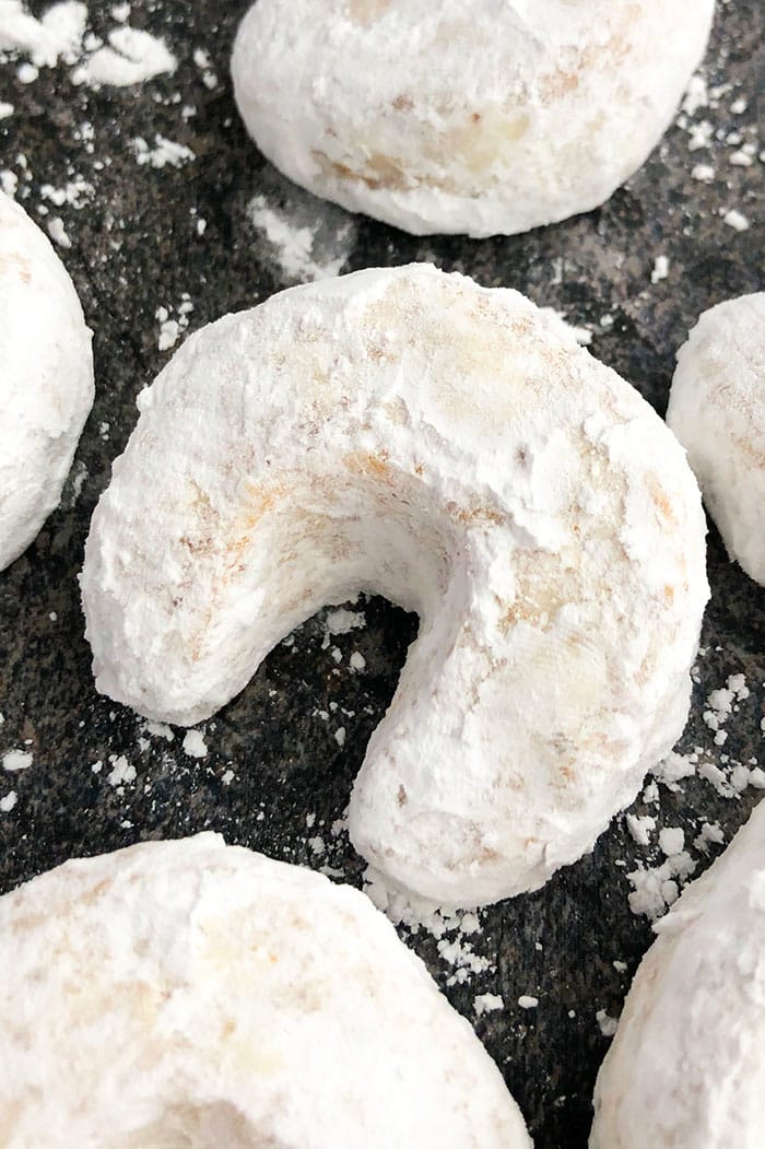 Classic Almond Crescent Cookies (Vanillekipferl) on Grayish Black Background- Overhead Shot