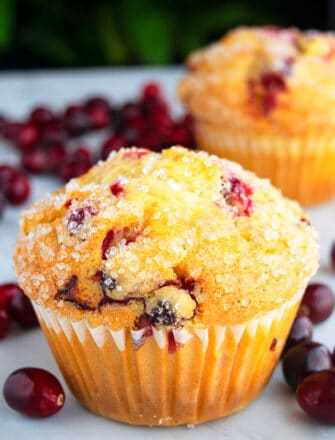 Quick, Soft, Fluffy, Easy Cranberry Orange Muffins on White Background