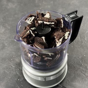 Broken up Oreos in a food processor. 