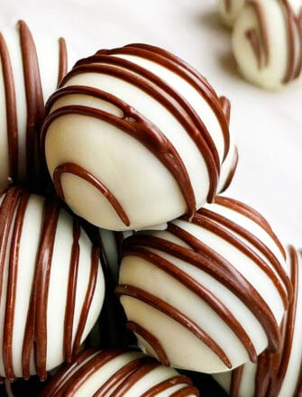 Stack of Easy Old Fashioned Chocolate Rum Balls on White Background