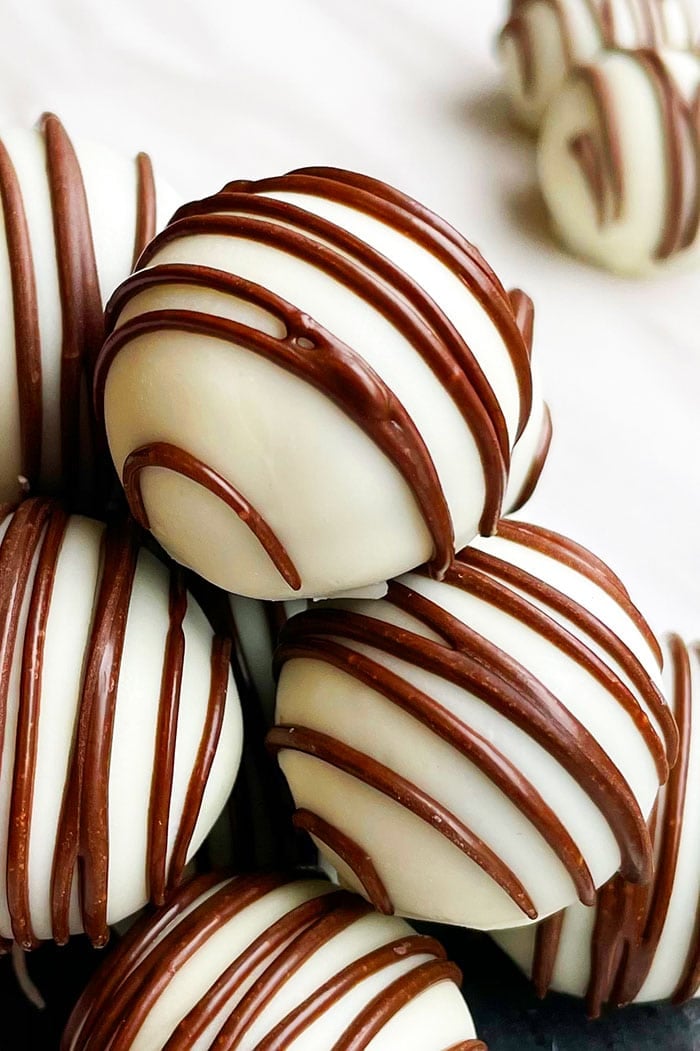 Stack of Easy Old Fashioned Chocolate Rum Balls on White Background 