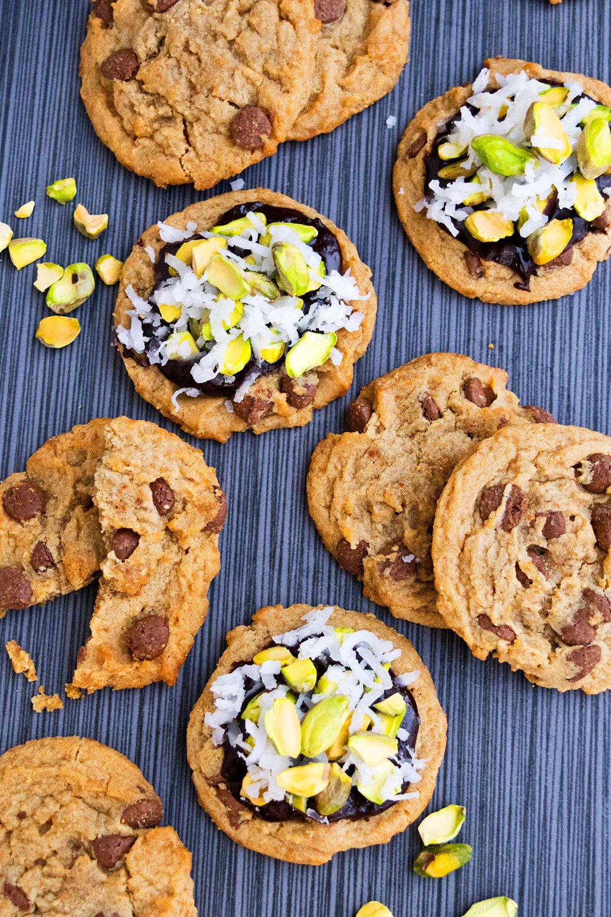 Frosted and Unfrosted Cookies on Striped Gray Background. 