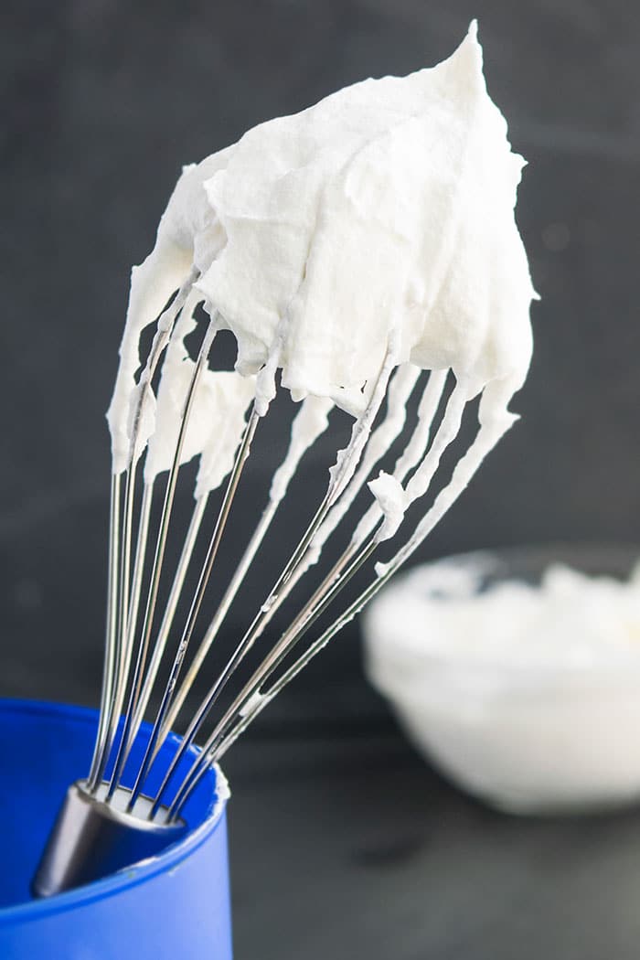 Best Stabilized Whipped Cream Frosting From Scratch on Spatula With Gray Background