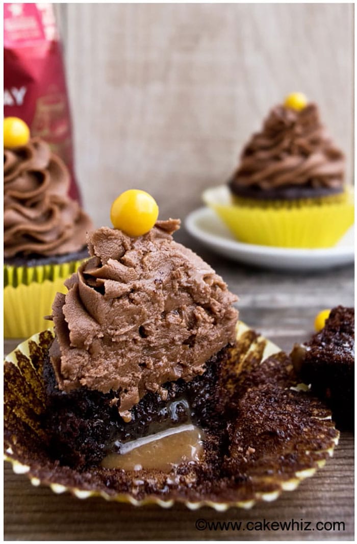 Mocha Cupcakes Filled With Caramel Sauce on Rustic Wood Background