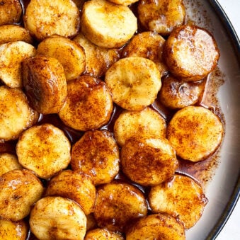 Easy Pan Fried Caramelized Bananas With Cinnamon Vanilla and Butter in White Dish