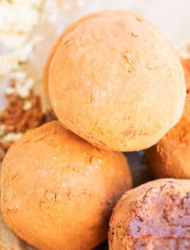 Stack of Easy Homemade Chocolate Champagne Truffles on Brown Paper