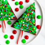 Easy Christmas Tree Brownies With Buttercream Frosting on White Dish.