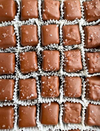 Easy Homemade Chocolate Caramel Candy Squares in White Wrappers in a Box