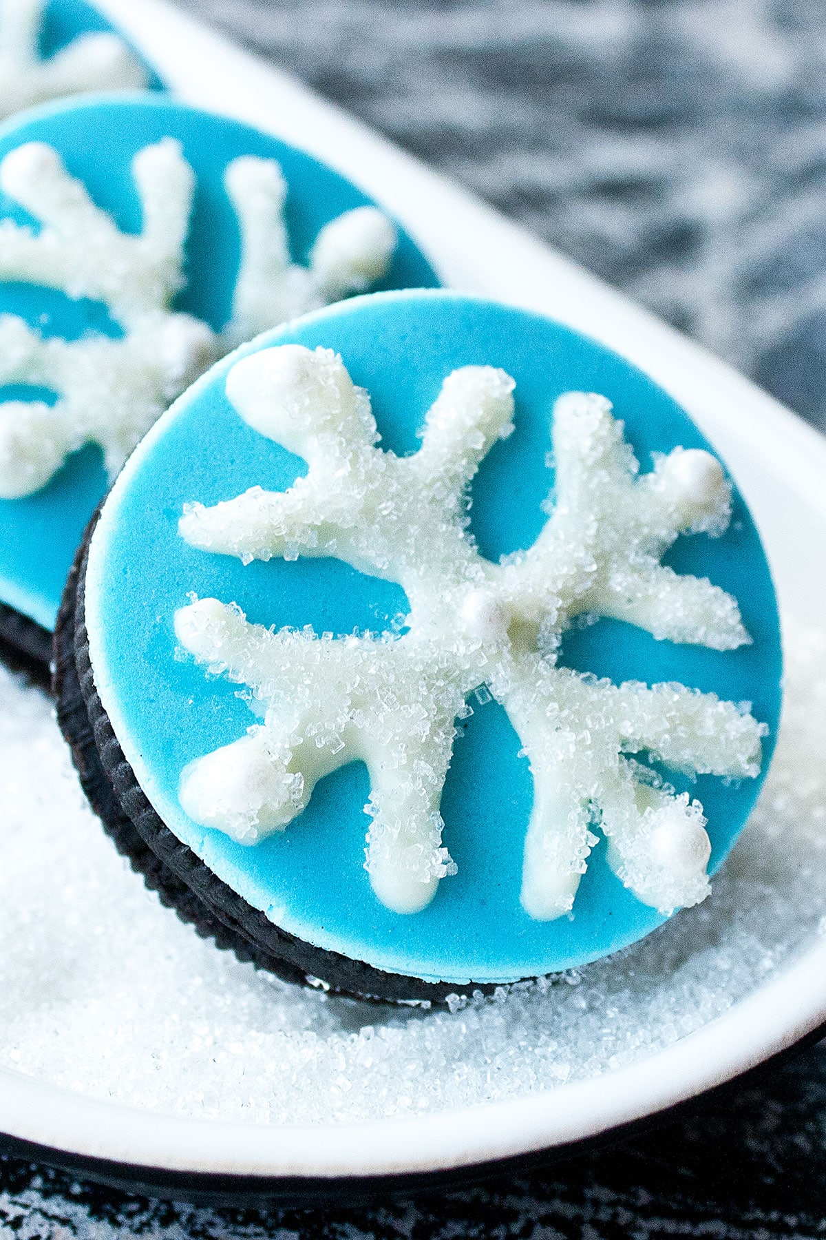 Easy Snowflake Oreos in White Dish- Closeup Shot.