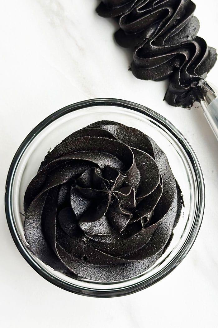 Easy Black Frosting With Black Cocoa Powder in Glass Bowl 