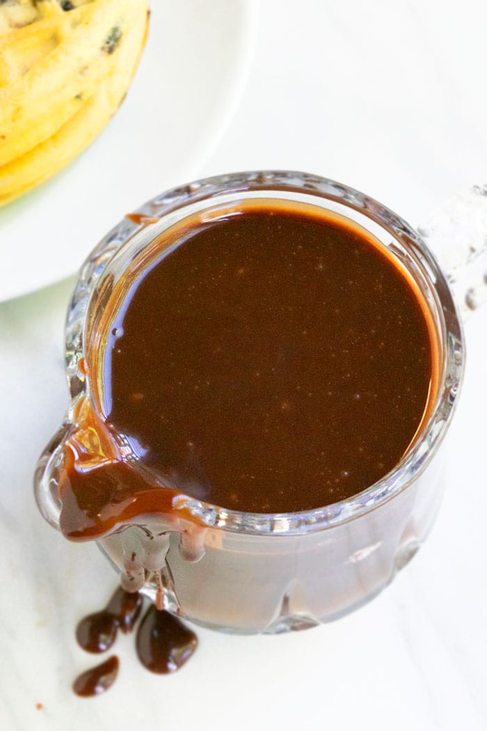 Easy Hot Fudge Sauce With Condensed Milk in Small Glass Pitcher 