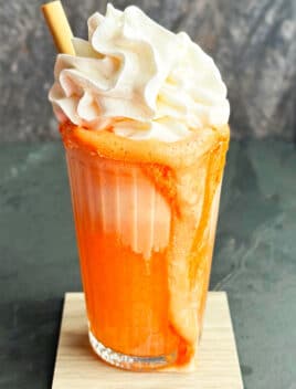 Easy Ice Cream Float With Fanta or Crush and Topped With Whipped Cream in Glass Cup