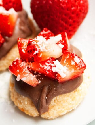 Easy Chocolate Covered Coconut Macaroons With Condensed Milk on White Dish