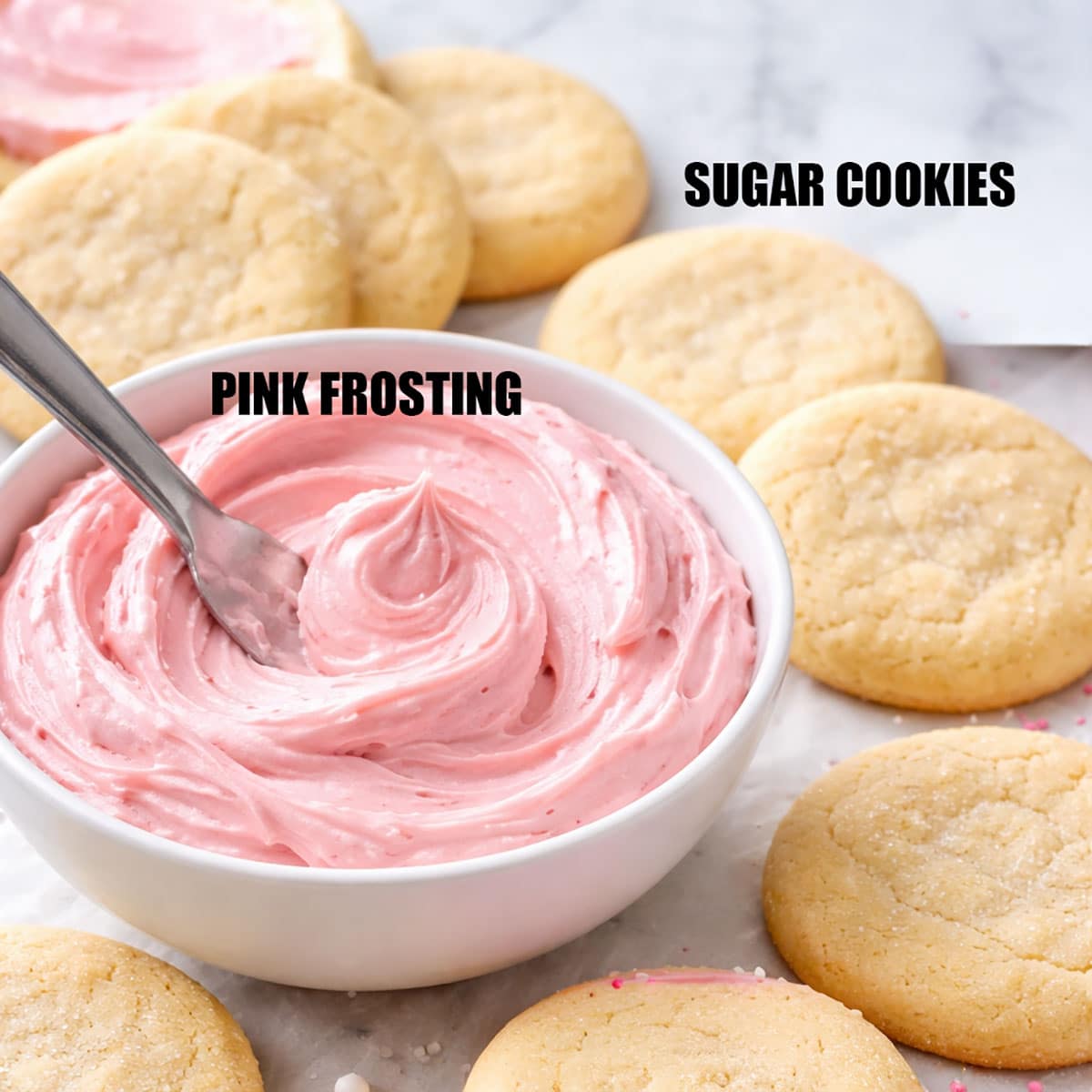 Individual ingredients for cookies on white marble background. 