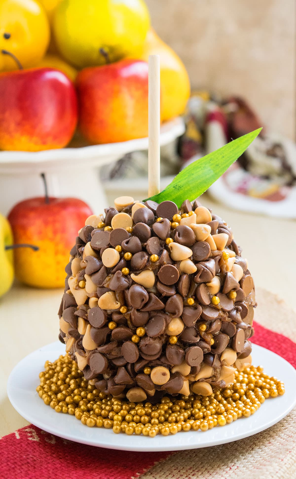 Dipped Caramel Apples on White Dish.