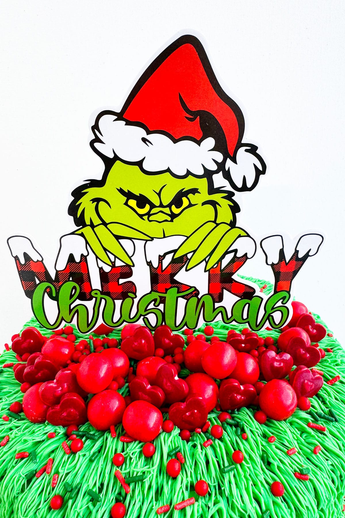 Closeup Shot of Grinch Topper on White Background. 