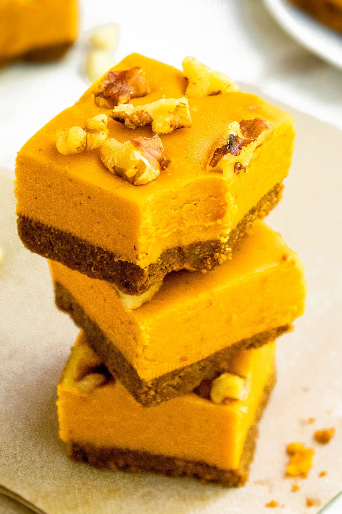 Stack of Easy Pumpkin Fudge With Gingersnap Crust.