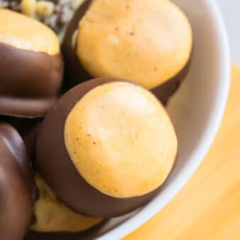 Easy Buckeyes Recipe (Chocolate Peanut Butter Balls) in White Bowl.