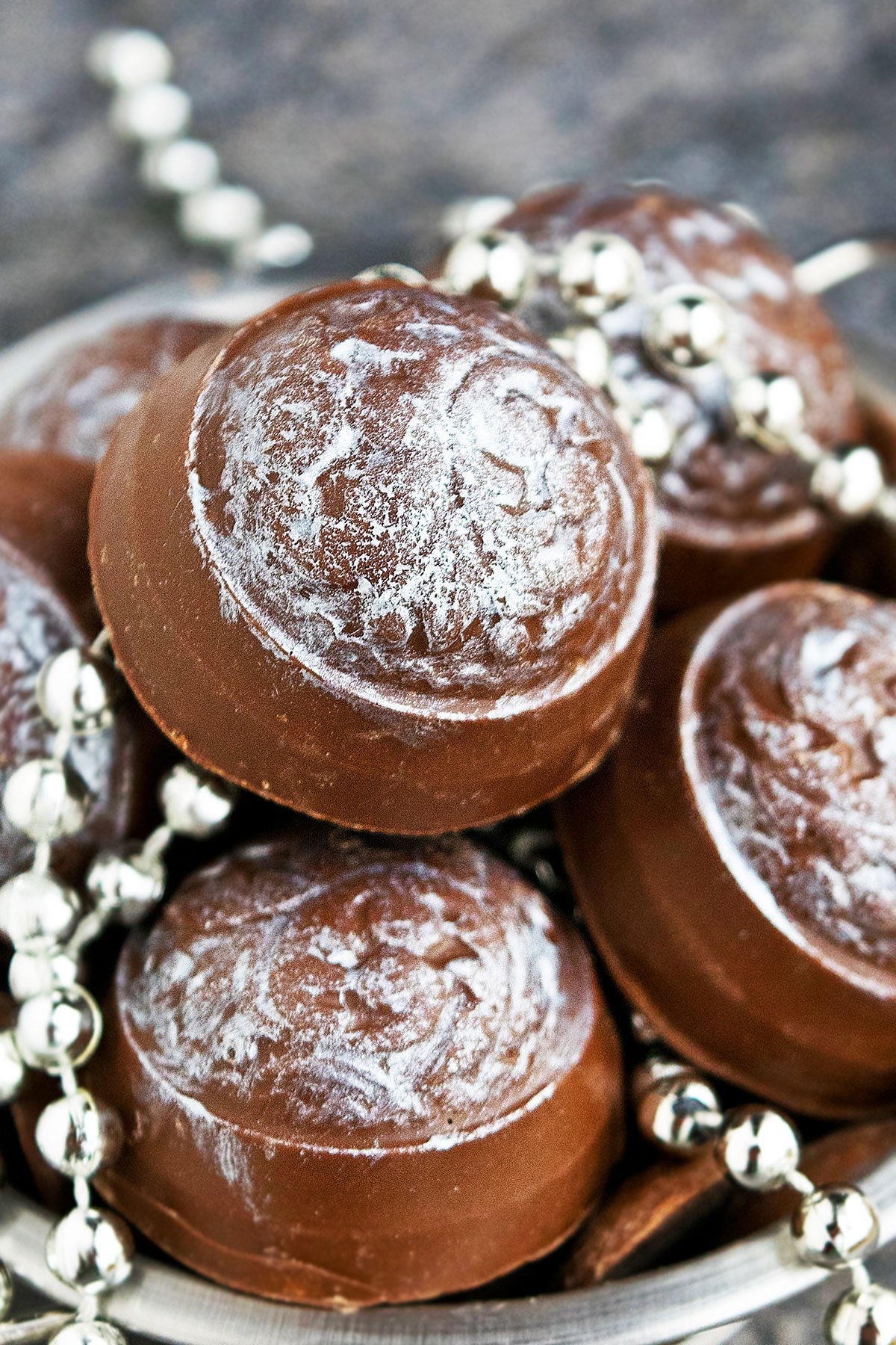 Stack of Decorated Chocolate Espresso Truffles - Closeup Shot.