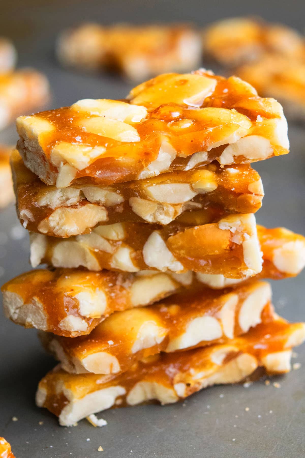 Stack of Homemade Brittle on Metal Tray. 