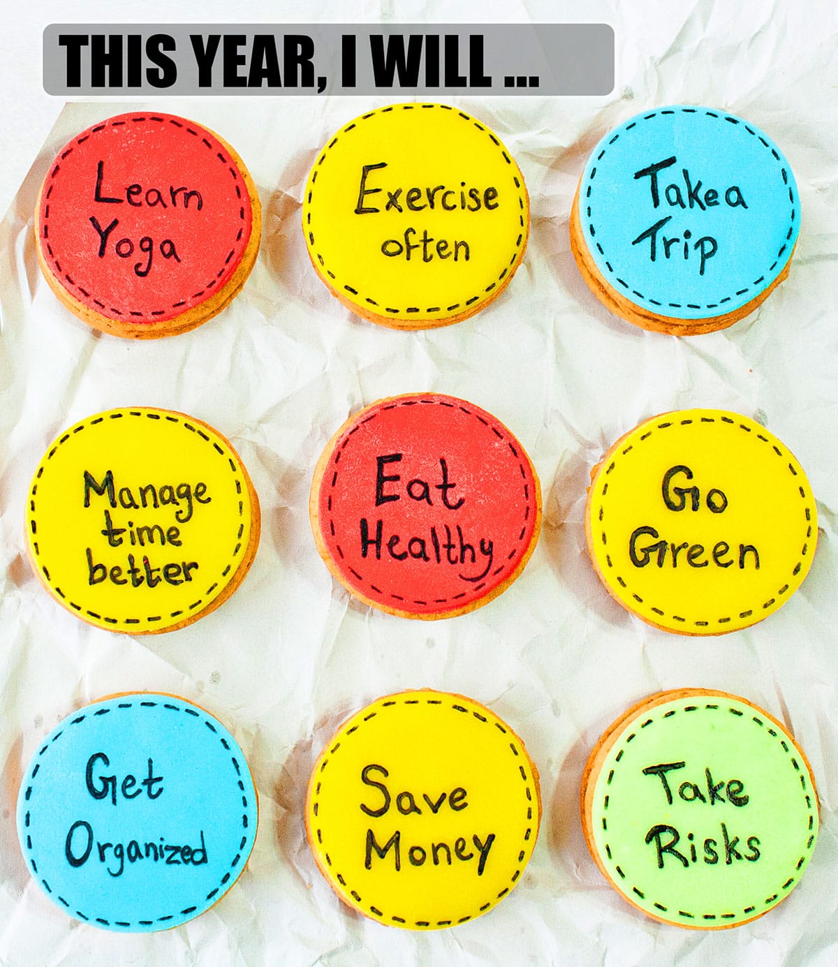 Easy Homemade Decorated Oreos For New Year's Eve Party With Resolutions on Crumpled Paper. 
