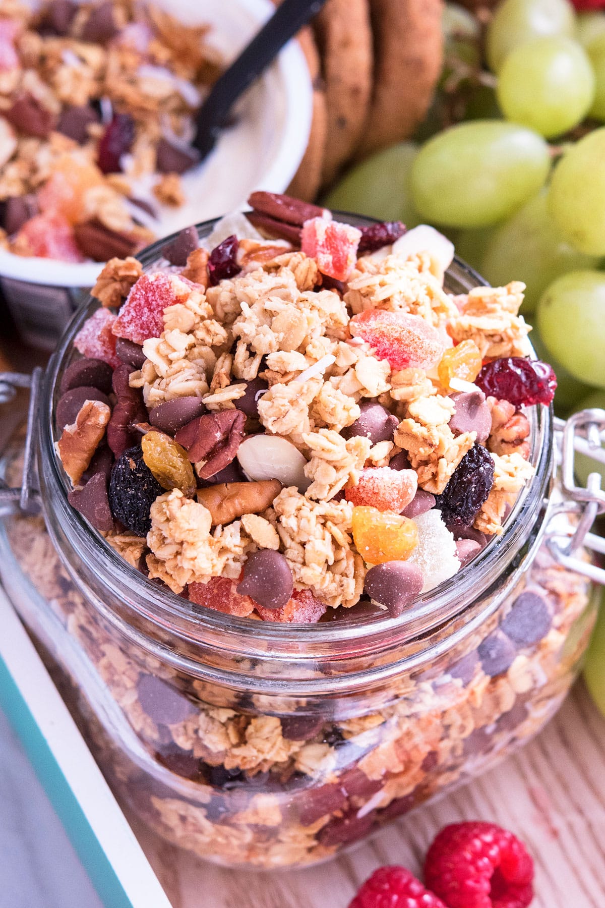 Homemade Granola Gift in Glass Jar on Large Tray With Fruits and Yogurt. 