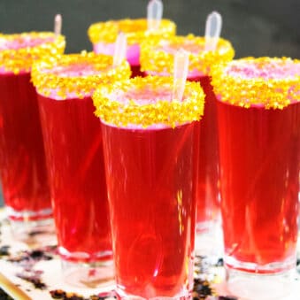 Easy Champagne Jello Shots (Jelly Shots) on Tray With Confetti.