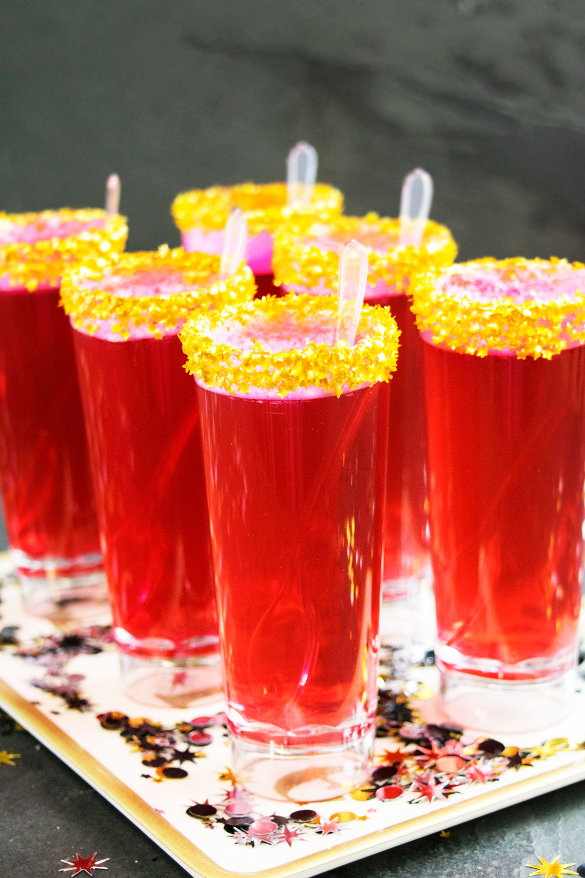 Easy Champagne Jello Shots (Jelly Shots) on Tray With Confetti.