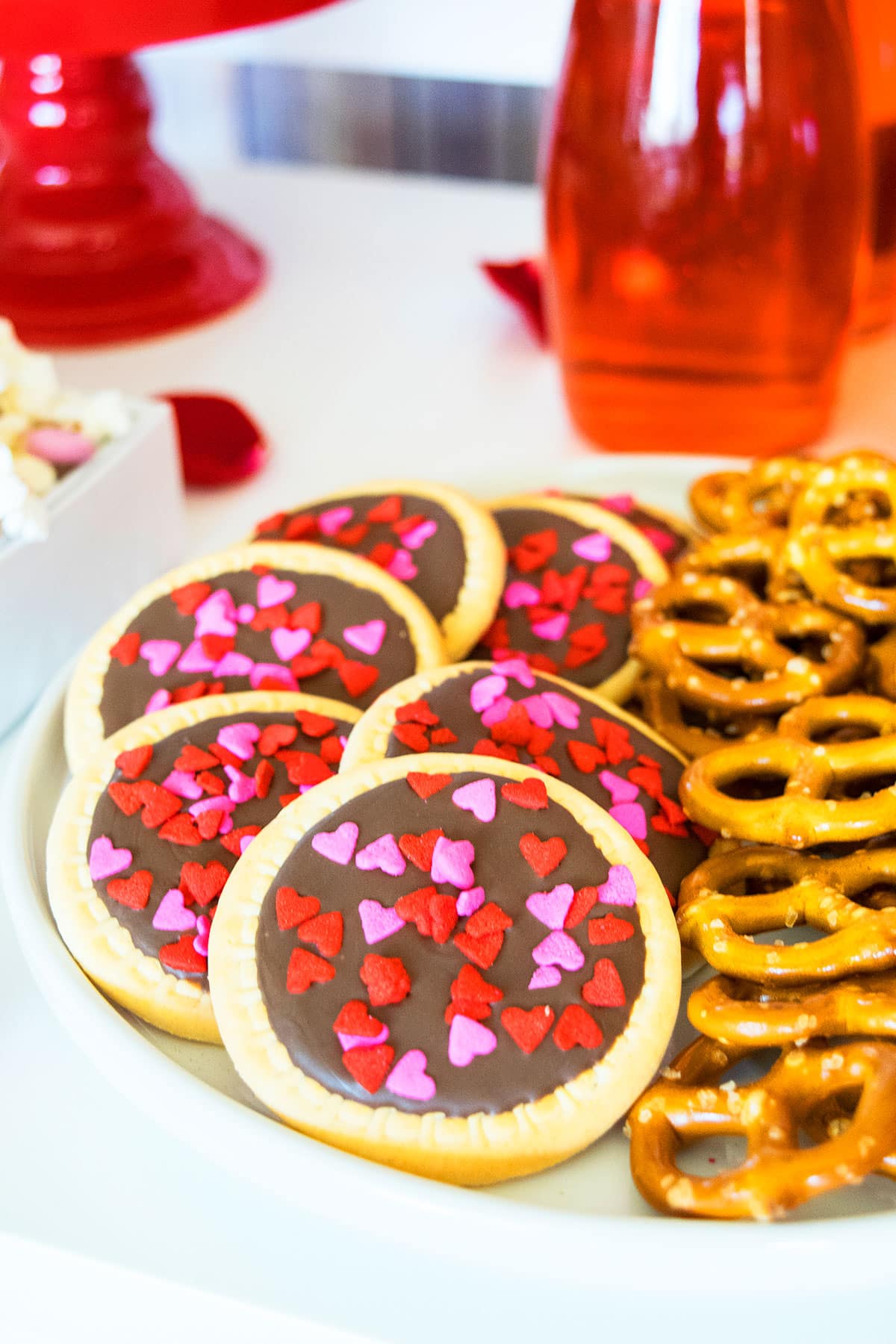 Round Sugar Cookies With Chocolate and Heart Sprinkles. 