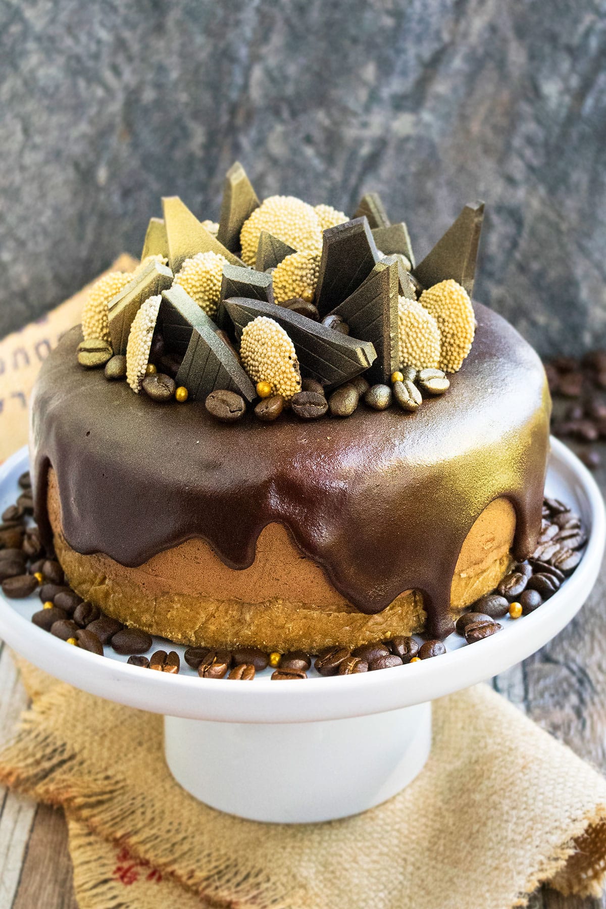 Easy Coffee Cheesecake With Ganache (No Bake) on White Cake Stand. 