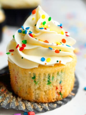 Best Easy Homemade Funfetti Cupcakes With Vanilla Buttercream Frosting- Liner Removed.