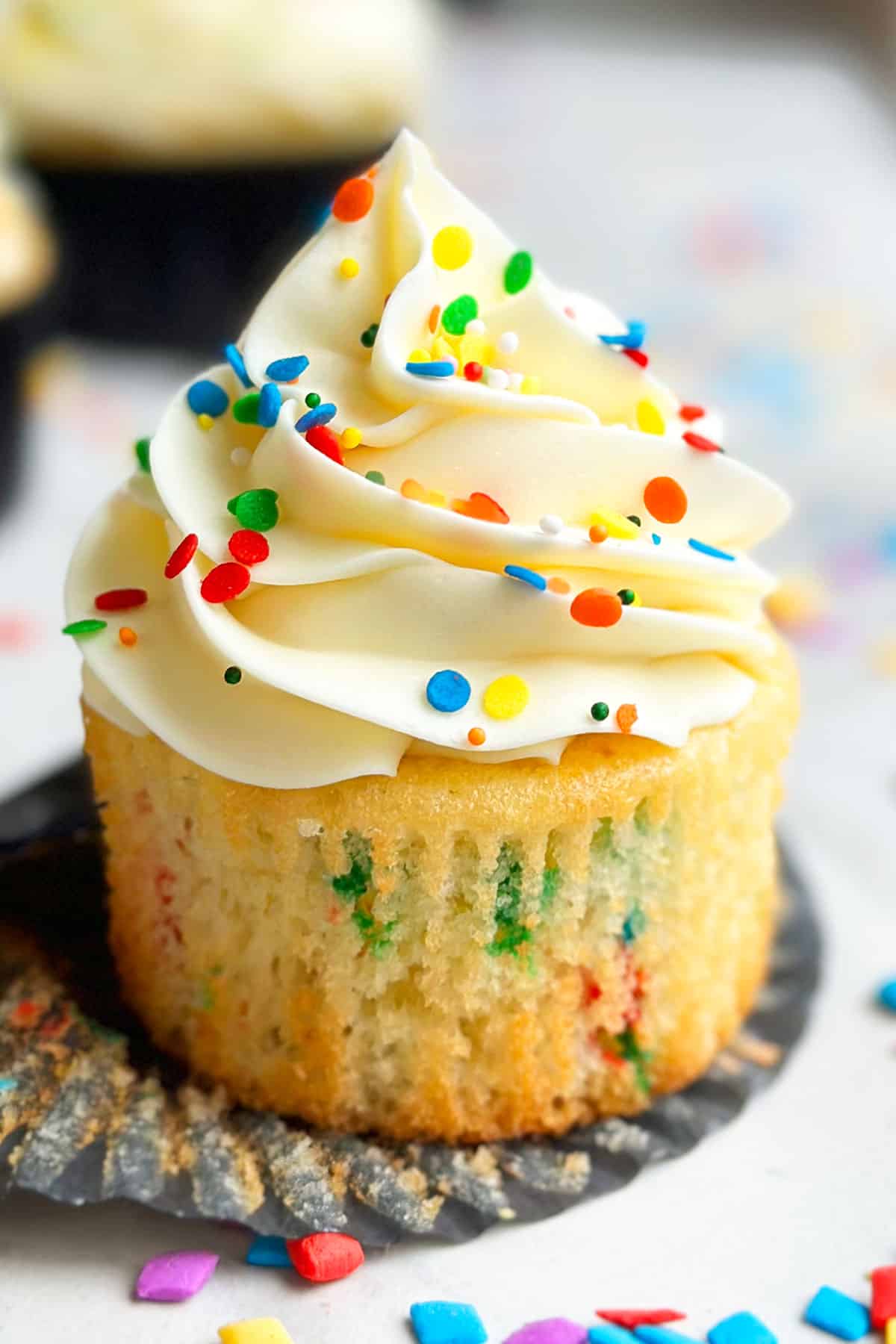 Best Easy Homemade Funfetti Cupcakes With Vanilla Buttercream Frosting- Liner Removed. 