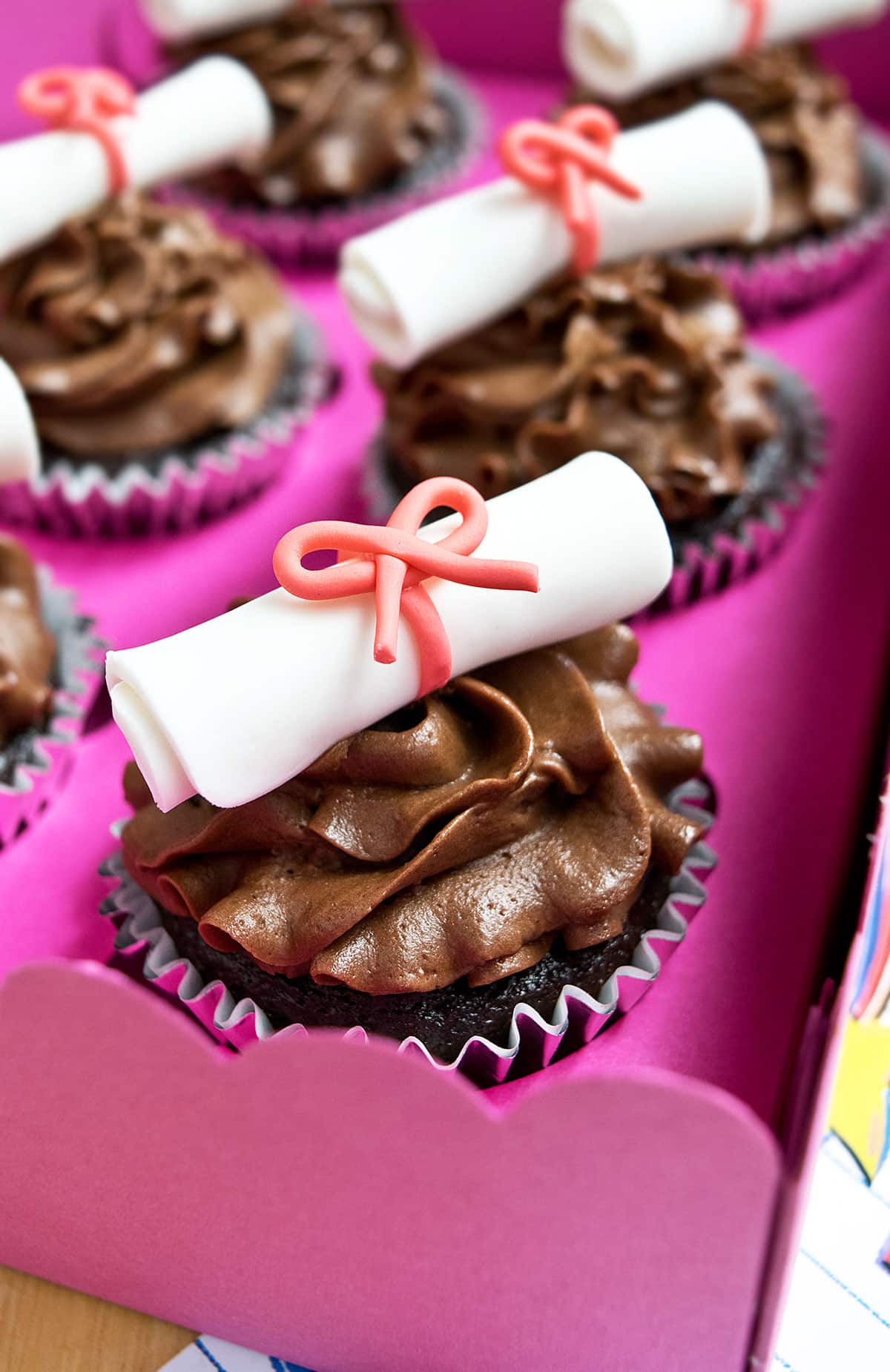 Decorated Cupcakes in a Pink Box. 