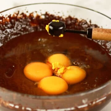 Eggs added to brownie batter. 