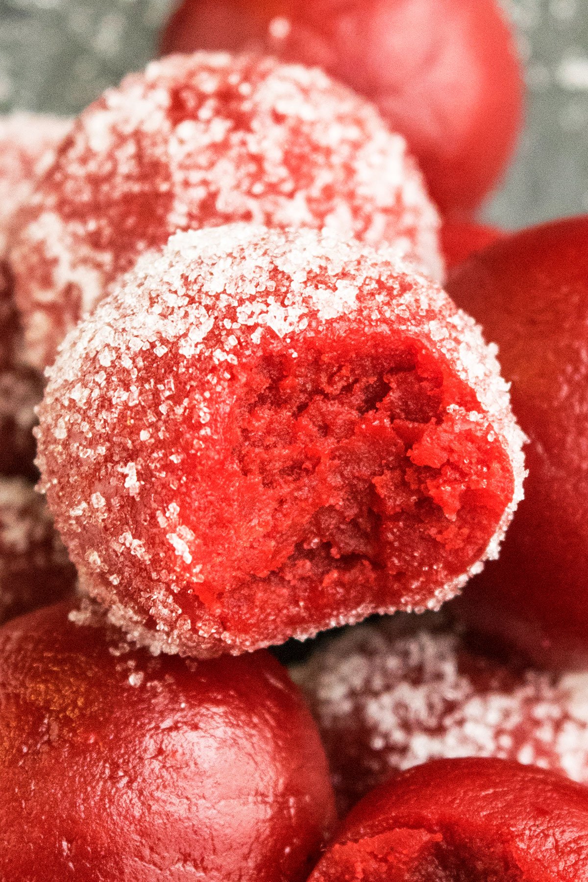 Partially Eaten Red Cake Ball- Closeup Shot. 