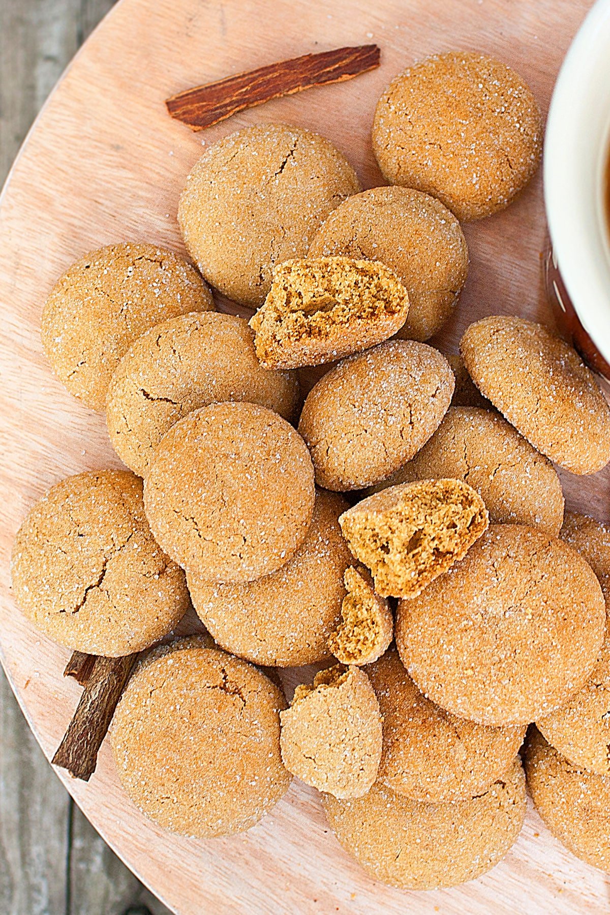 Whole and Partially Eaten Cookies on Rustic Wood Background. 