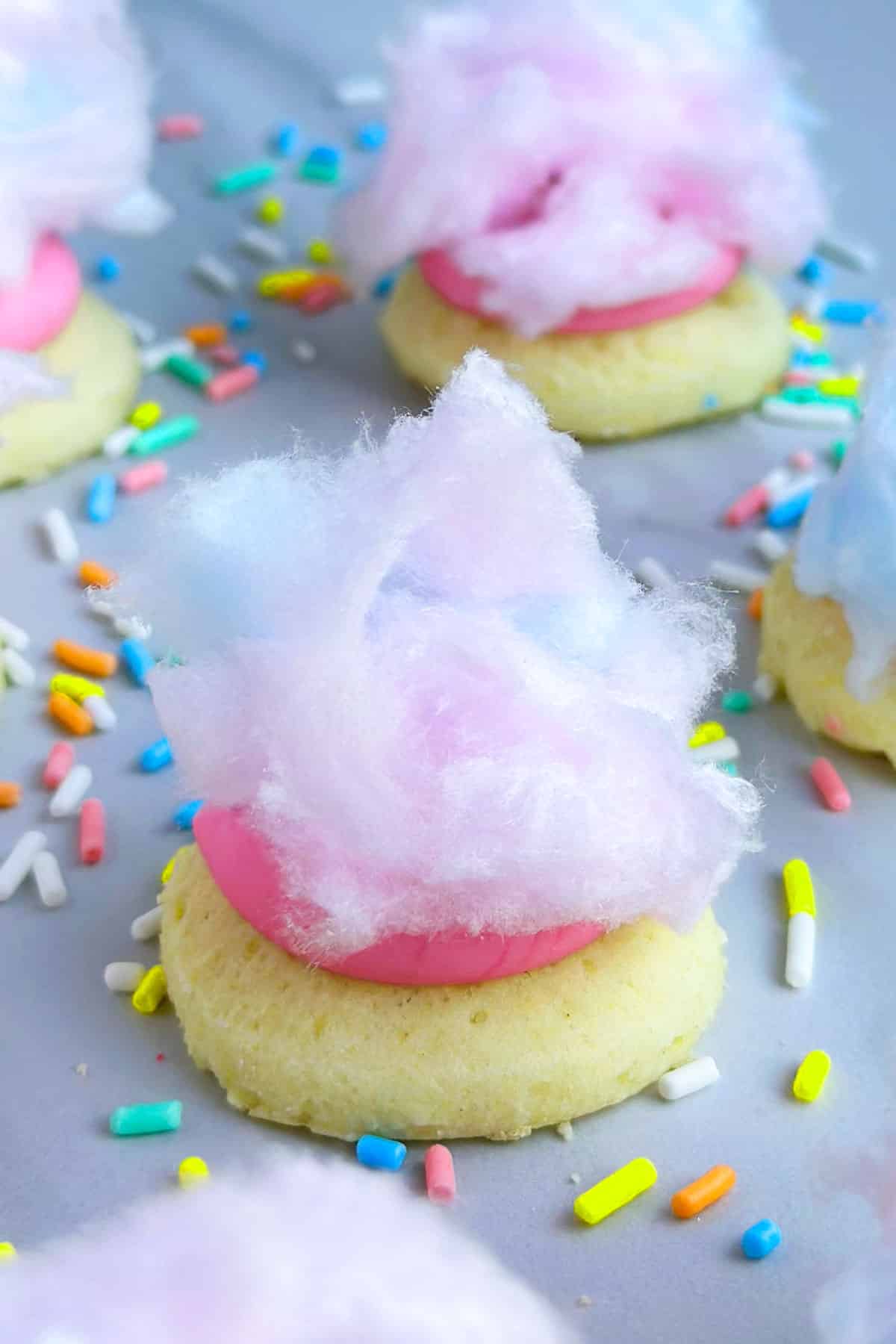 Easy Cotton Candy Cookies on White Marble Background With Sprinkles. 