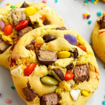 Easy Loaded Leftover Candy Cookies (Halloween) on Marble Background- Closeup Shot.