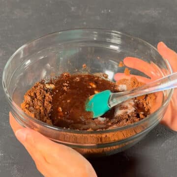 Large glass bowl with melted mixture. 