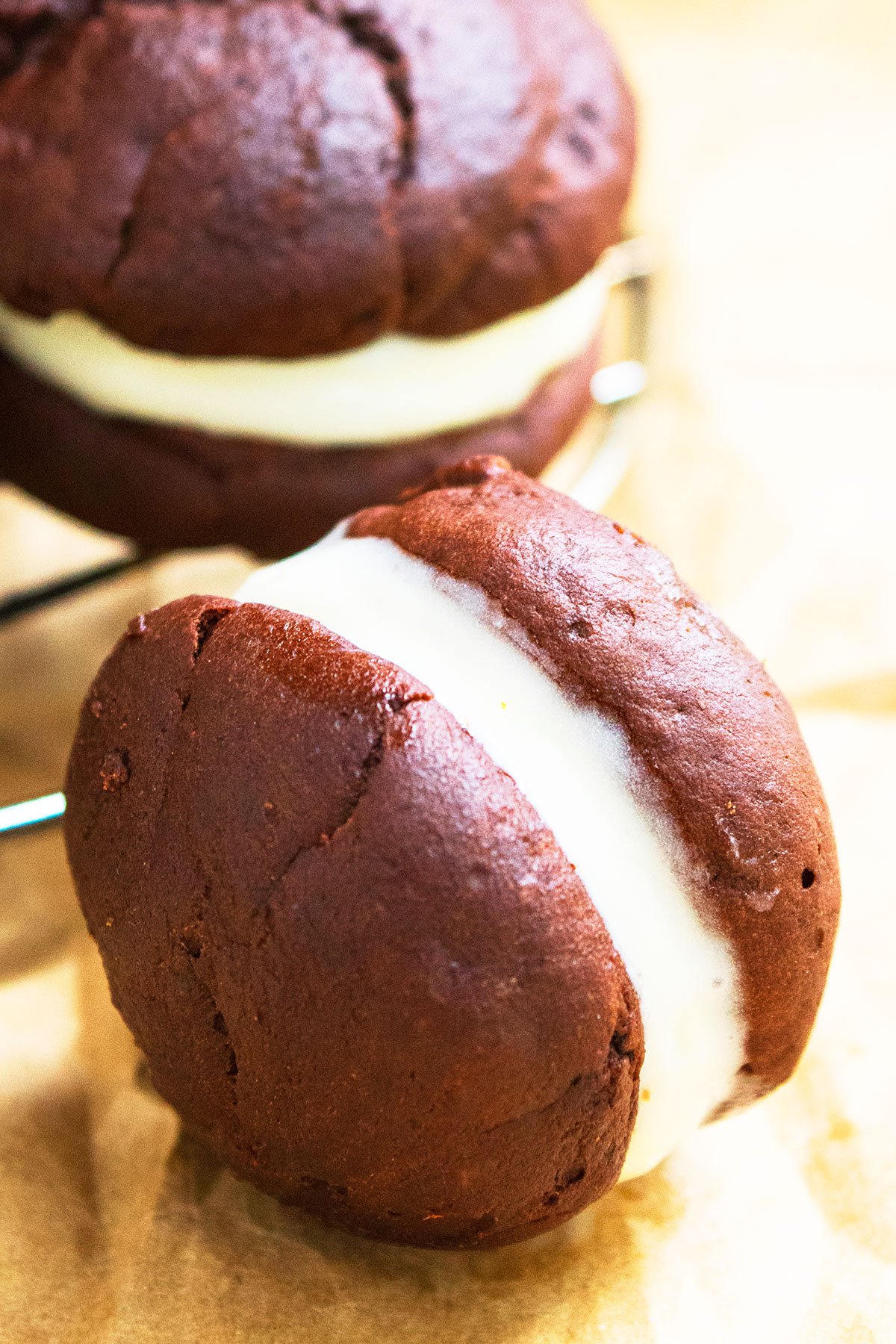 Cookie Sandwich on Its Side on Brown Parchment Paper. 