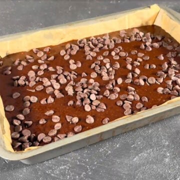 Chocolate chips being sprinkled on top. 