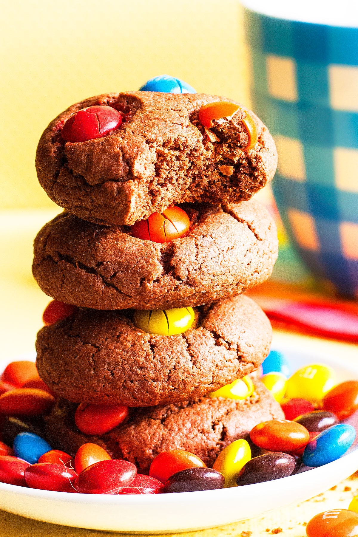 Stack of Cake Mix Cookies With Colorful Candies on White Dish.