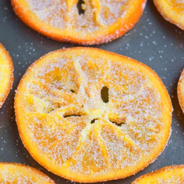 Easy Candied Orange Slices on Gray Tray.