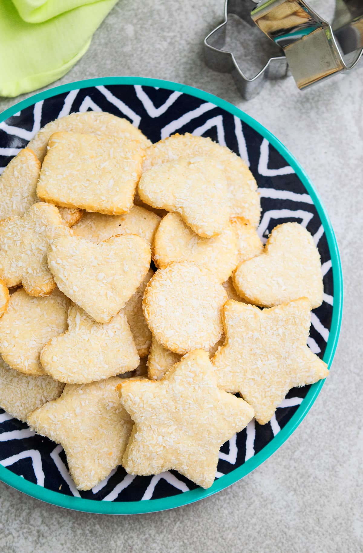 Cut Out Cookies on Pattern Dish- Overhead Shot. 