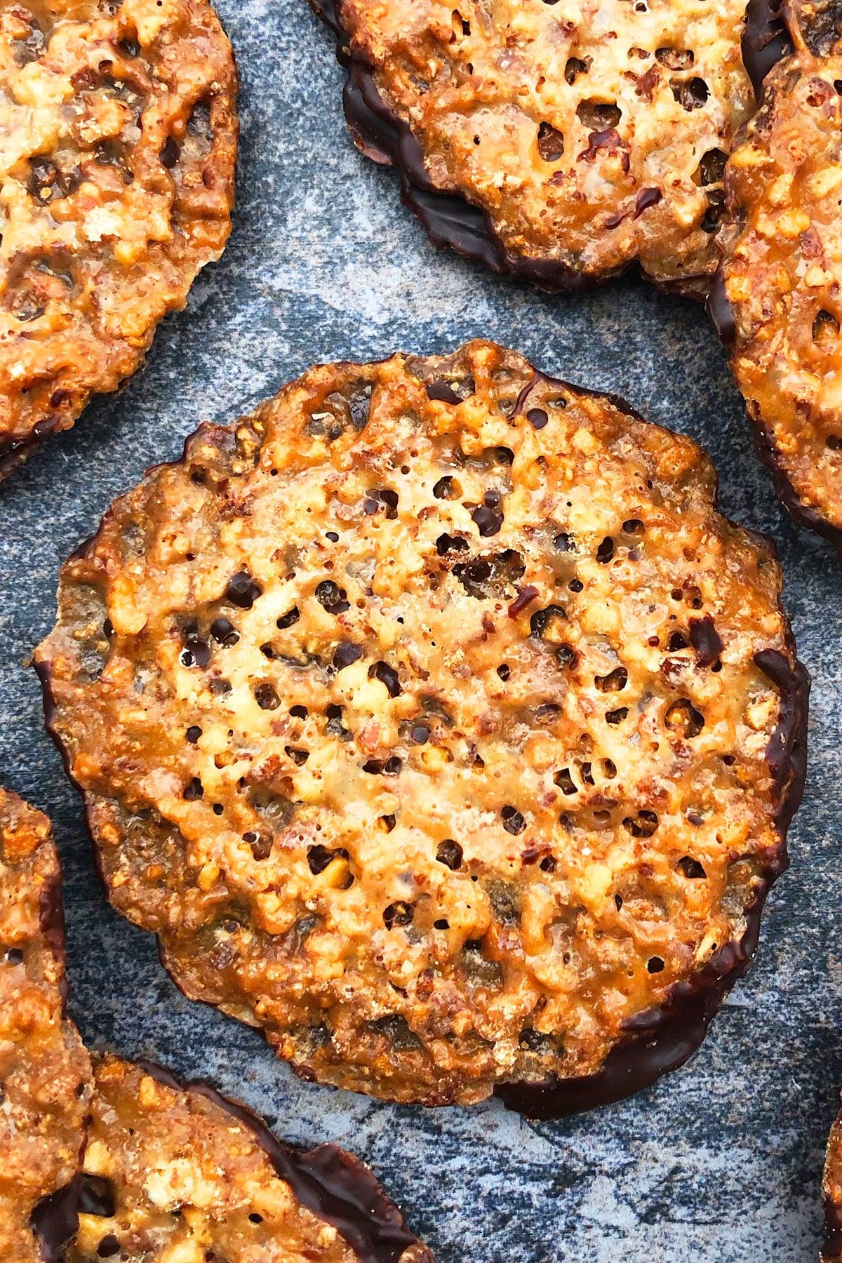 Easy Oatmeal Lace Cookies With Chocolate on Rustic Gray Background. 