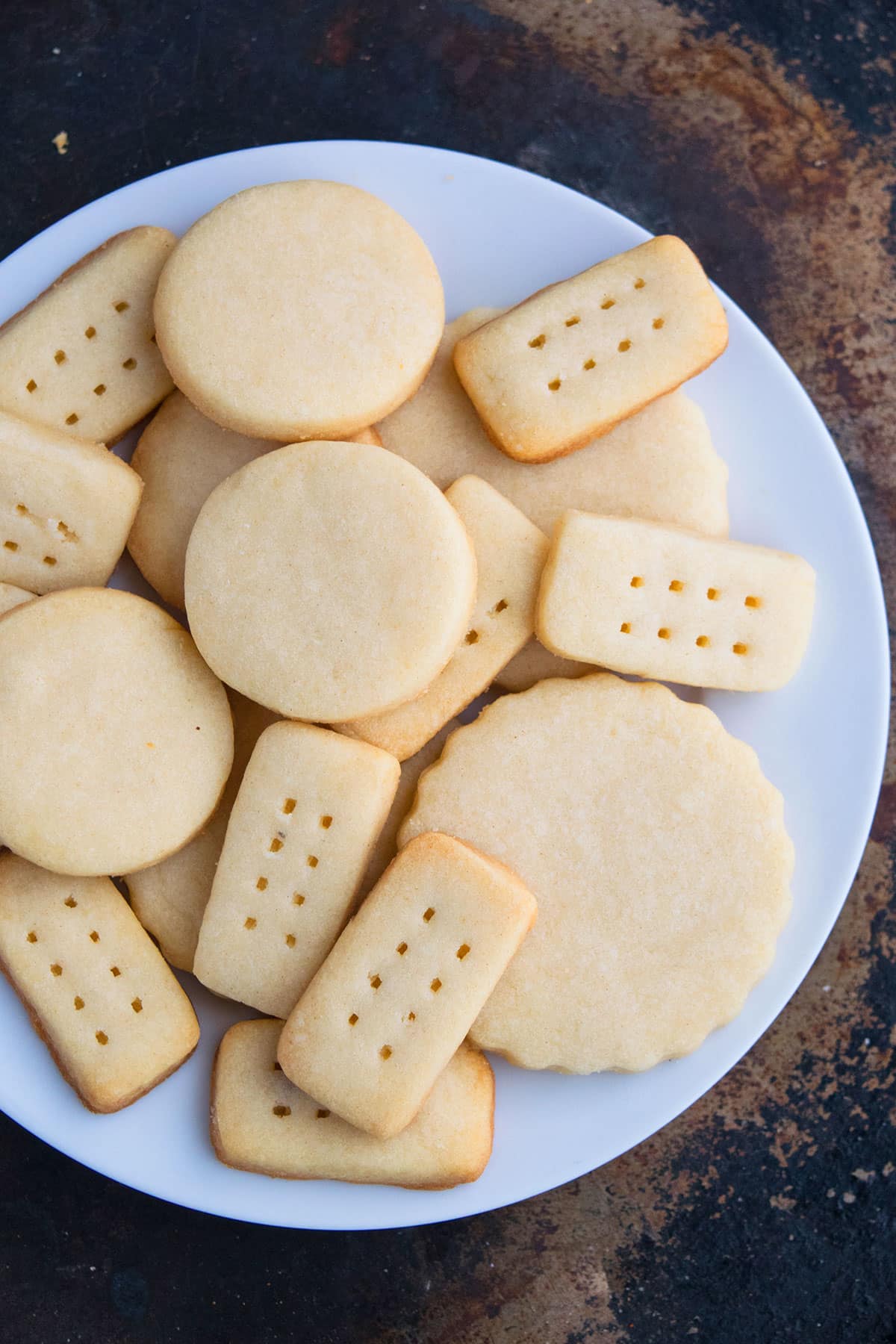 Christmas Whipped Cut Out Cookies on White Dish. 