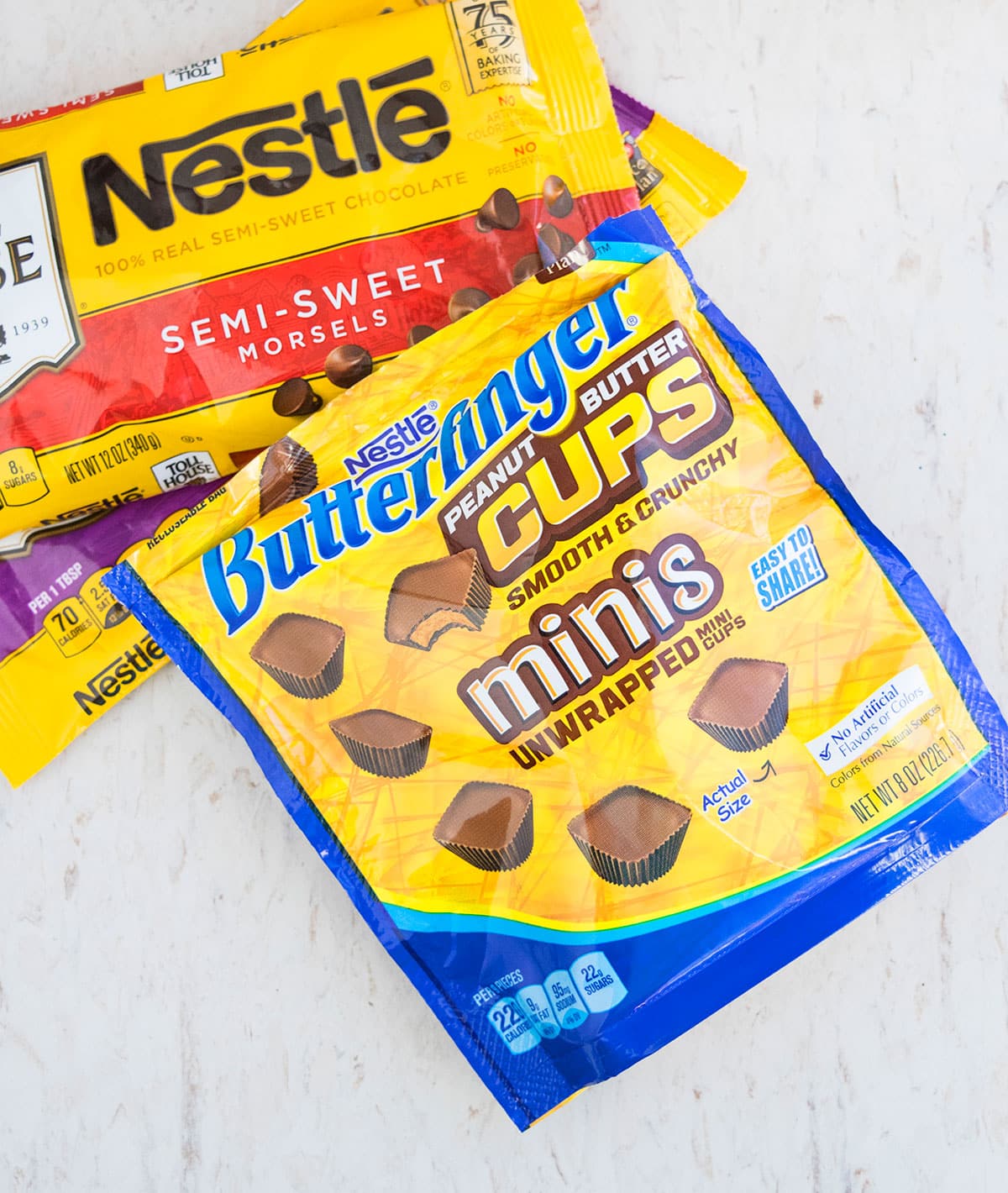 Variety of Nestle Chocolates on White Marble Background. 